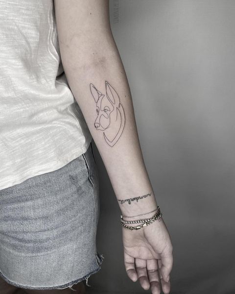 Simple lined german shepherd tattoo design with meaning Simple lined german shepherd tattoo design with meaning