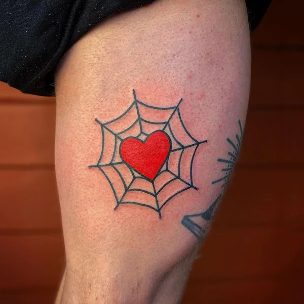 Simple spider web tattoo