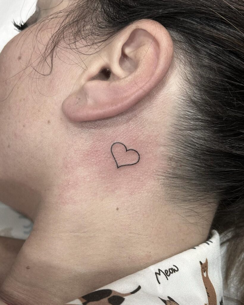 Simplicitys charm heart outline tattoo designs for women on the side neck
