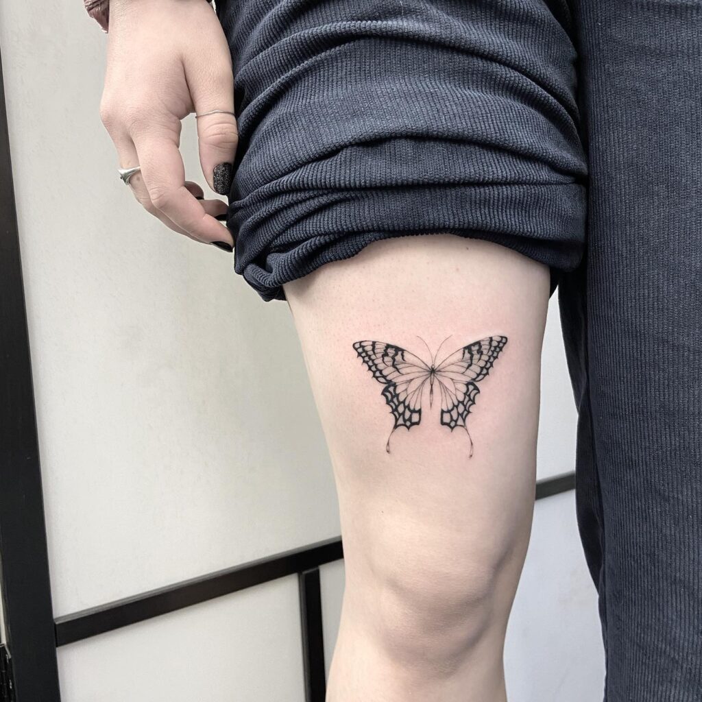 Single needle butterfly delicate detailing on your thigh