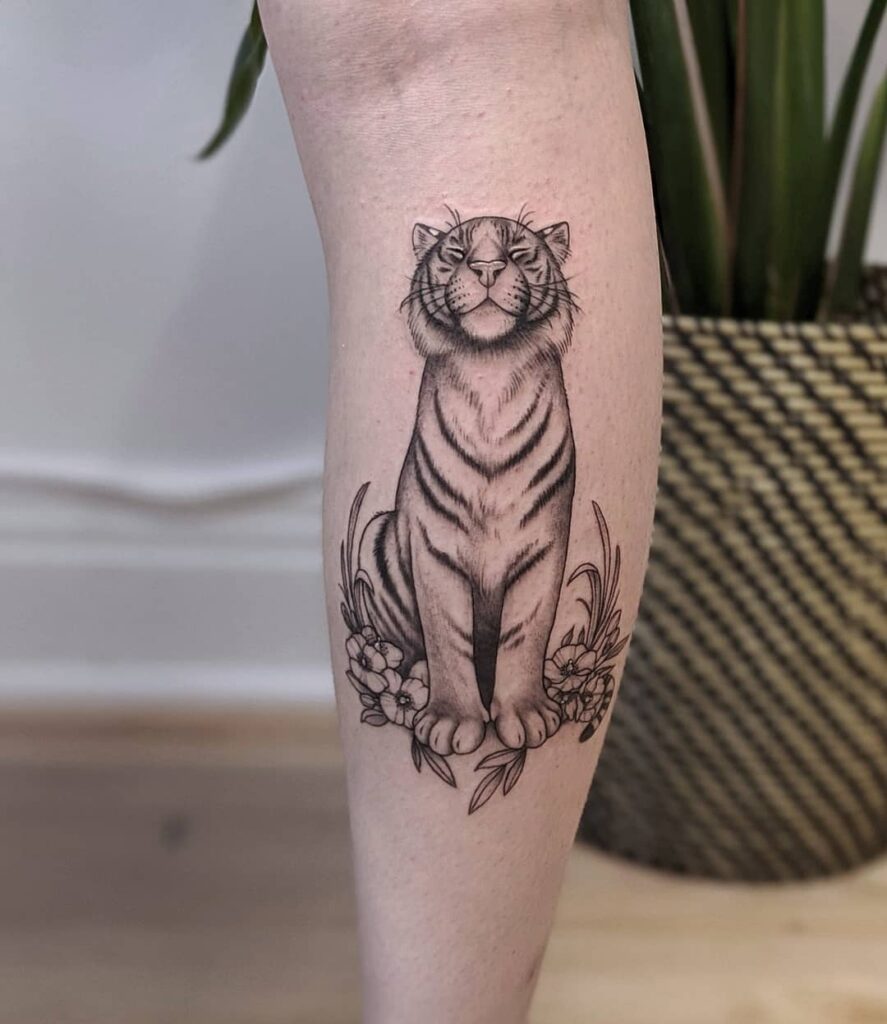 Sitting Tiger Front View with Flowers and Closed Eyes on the Calf: Tiger Tranquility 