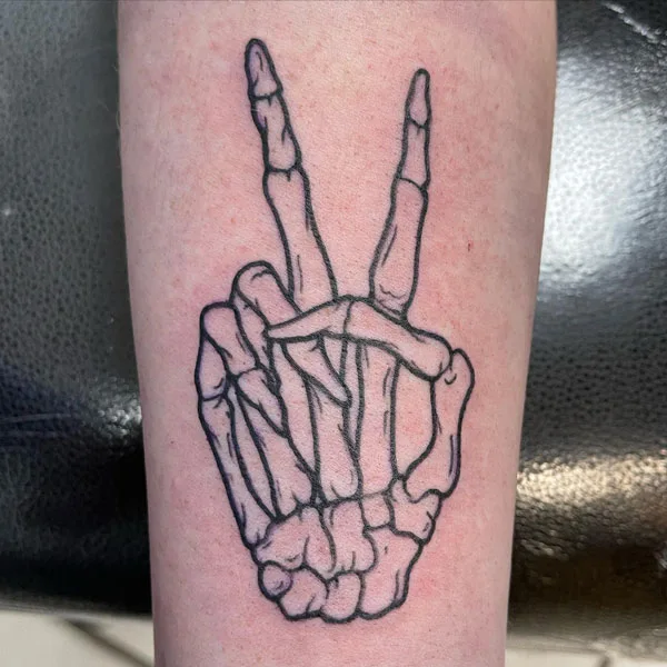 Skeleton hand outline tattoo