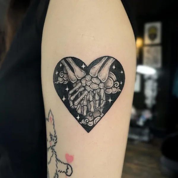 Skeleton hand tattoo 13