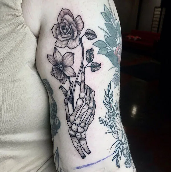 Skeleton hand tattoo 36