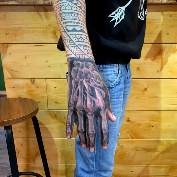 Skeleton hand tattoo 45