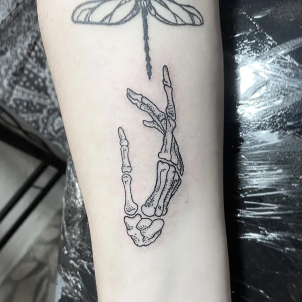 Skeleton hand tattoo 57