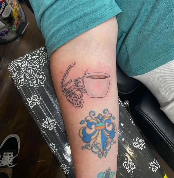 Skeleton hand tattoo 95