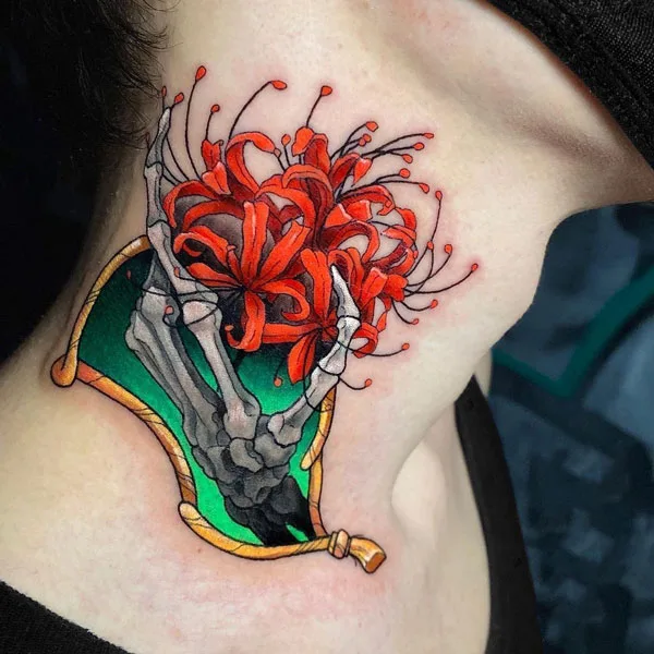 Skeleton hand tattoo on neck