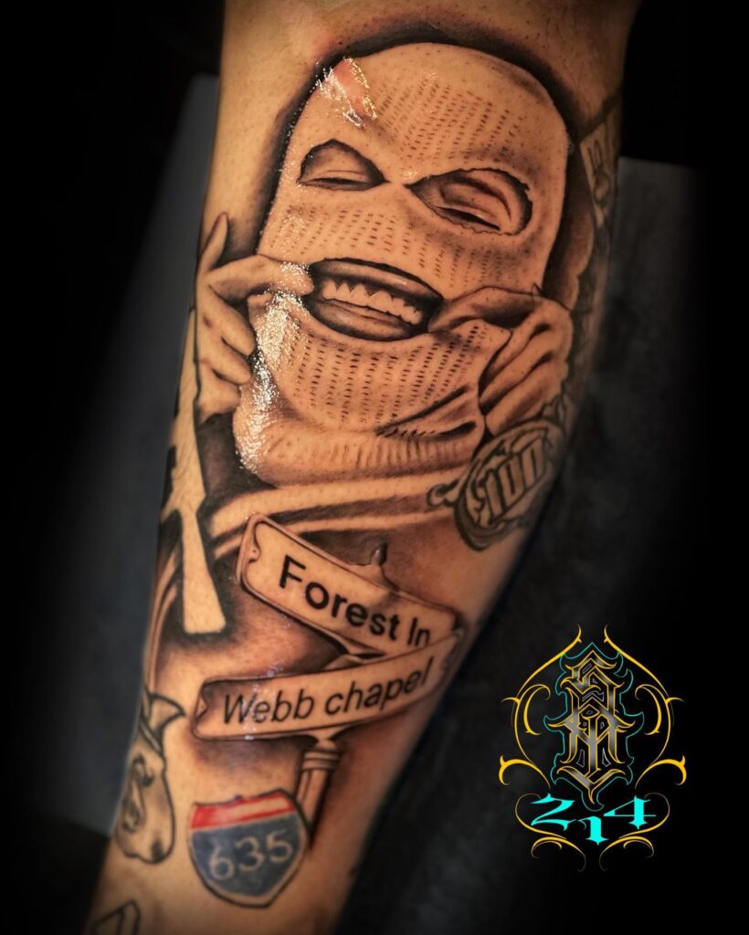 Ski mask and webb chapel street signs calf tattoo an intriguing leg sleeve