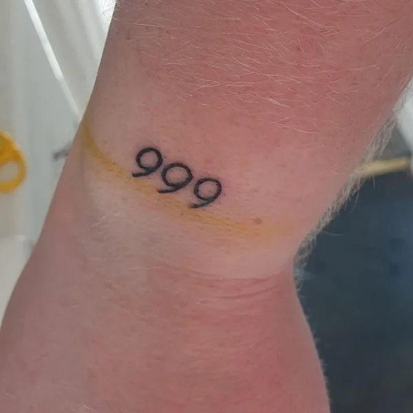 Small 999 tattoo 1