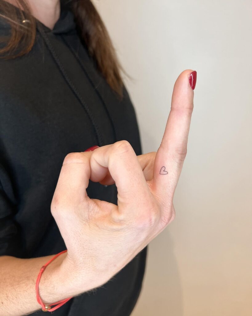 Small Outline Heart Shape on the Side of the Middle Finger, a Subtle Expression of Love: Heartfelt Whispers