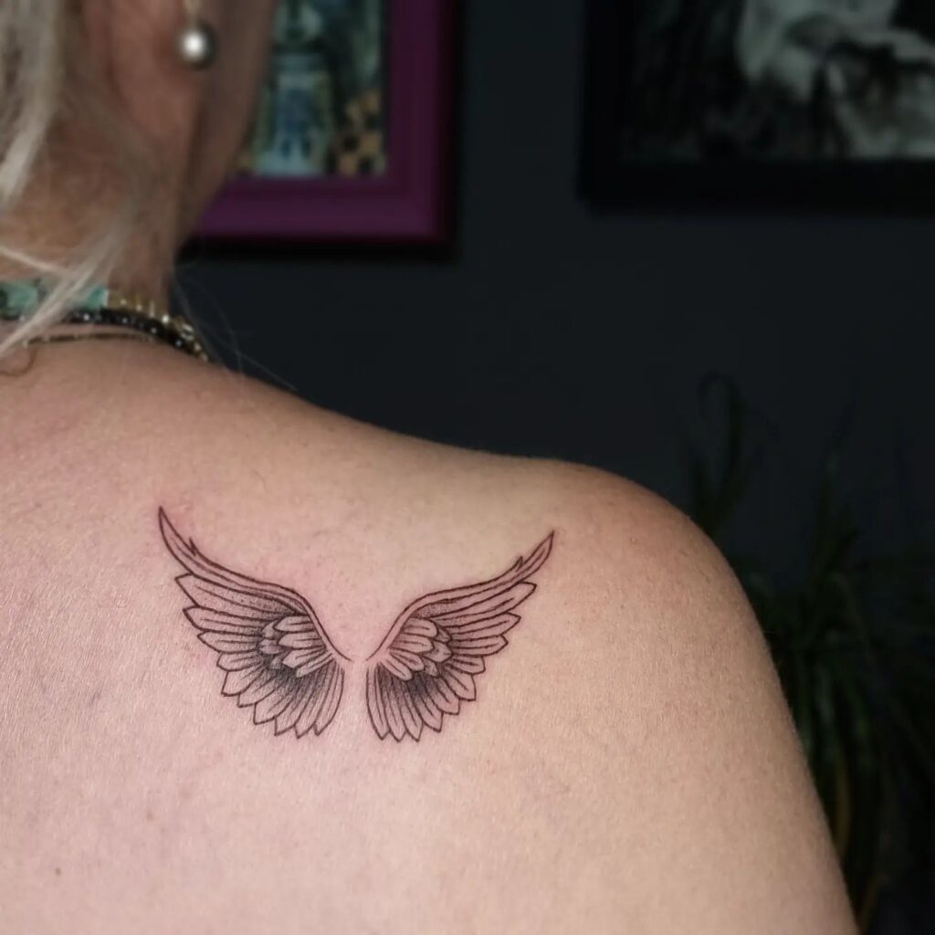 Small Angel Wings Tattoo Back of the Shoulder for a Delicate Touch: Shoulder Grace