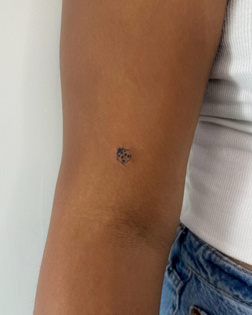 Small bee inner elbow tattoo unique design with detailed patterns