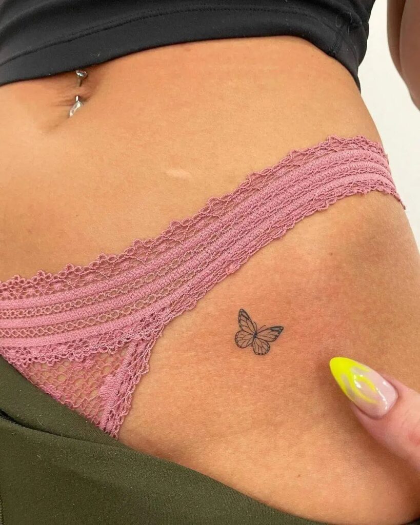 Small butterfly hip tattoo graceful and feminine insect design