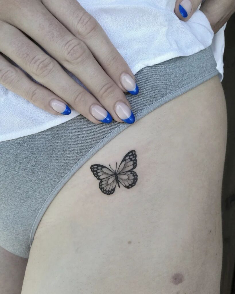 Small Butterfly Tattoo on the Hip: Graceful Flutter, a Symbol of Transformation