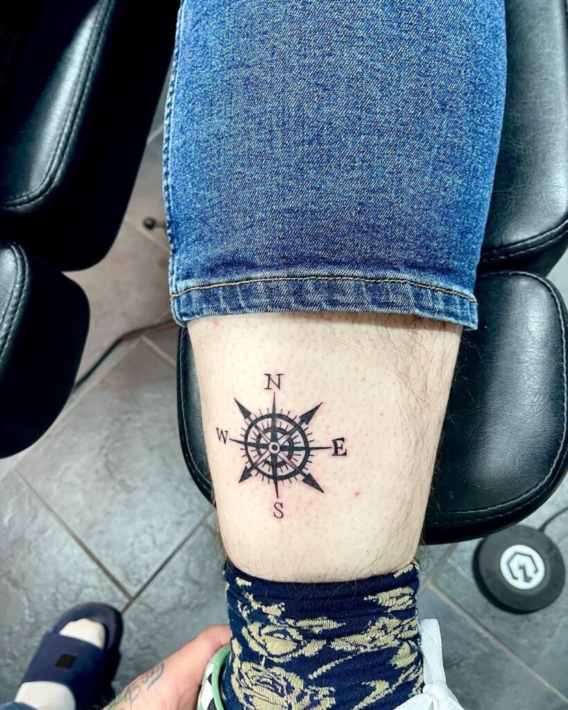 Small Compass Above the Ankle Tattoo for Subtle Guidance: Tiny Wanderer