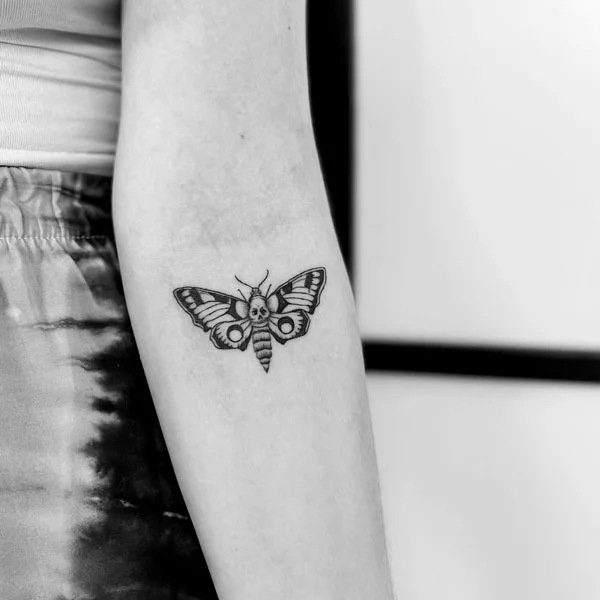 Small death moth tattoo