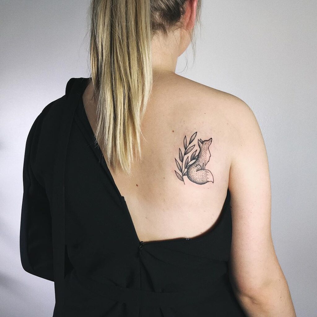 Small Fox with Plant Flower Tattoo Featuring a Long-Tailed Fox on the Shoulder Blade: Shoulder Bloom