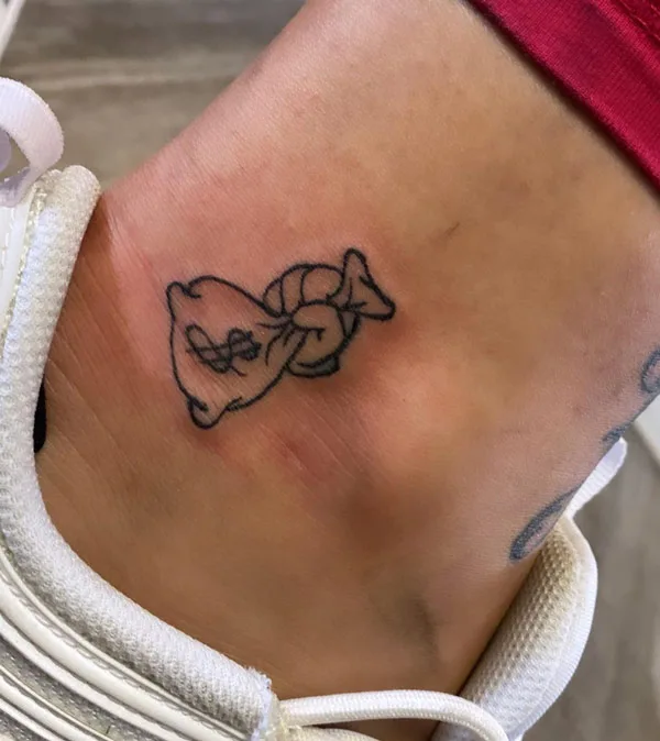 Small money bag tattoo