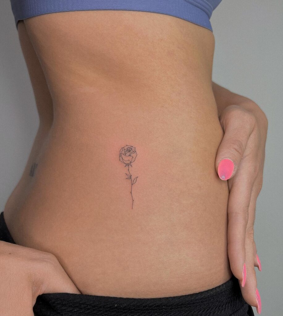 Small Rose Side Waist Tattoo for a Touch of Feminine Beauty: Floral Whispers