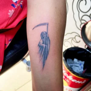 Small santa muerte tattoo 1