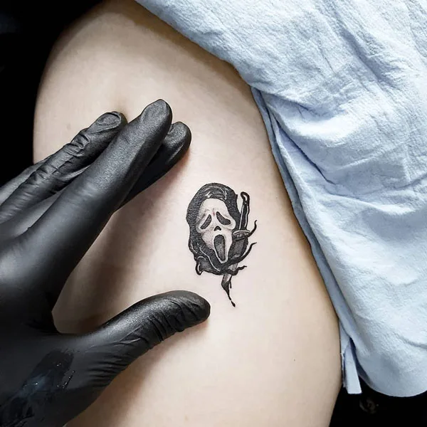 Small scream tattoo