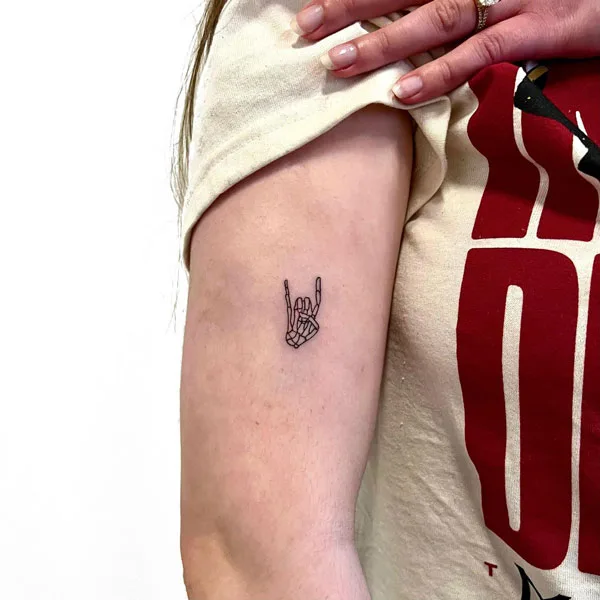 Small skeleton hand tattoo