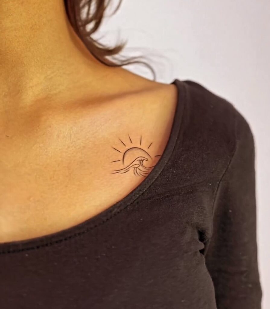 Small wave and sun cute chest tattoos for females playful and artistic ink