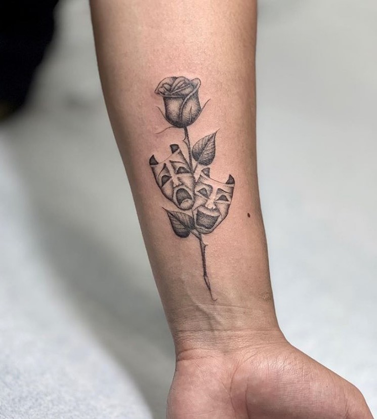 Smile Now Cry Later Mask with Rose Tattoo: Inner Wrist Elegance