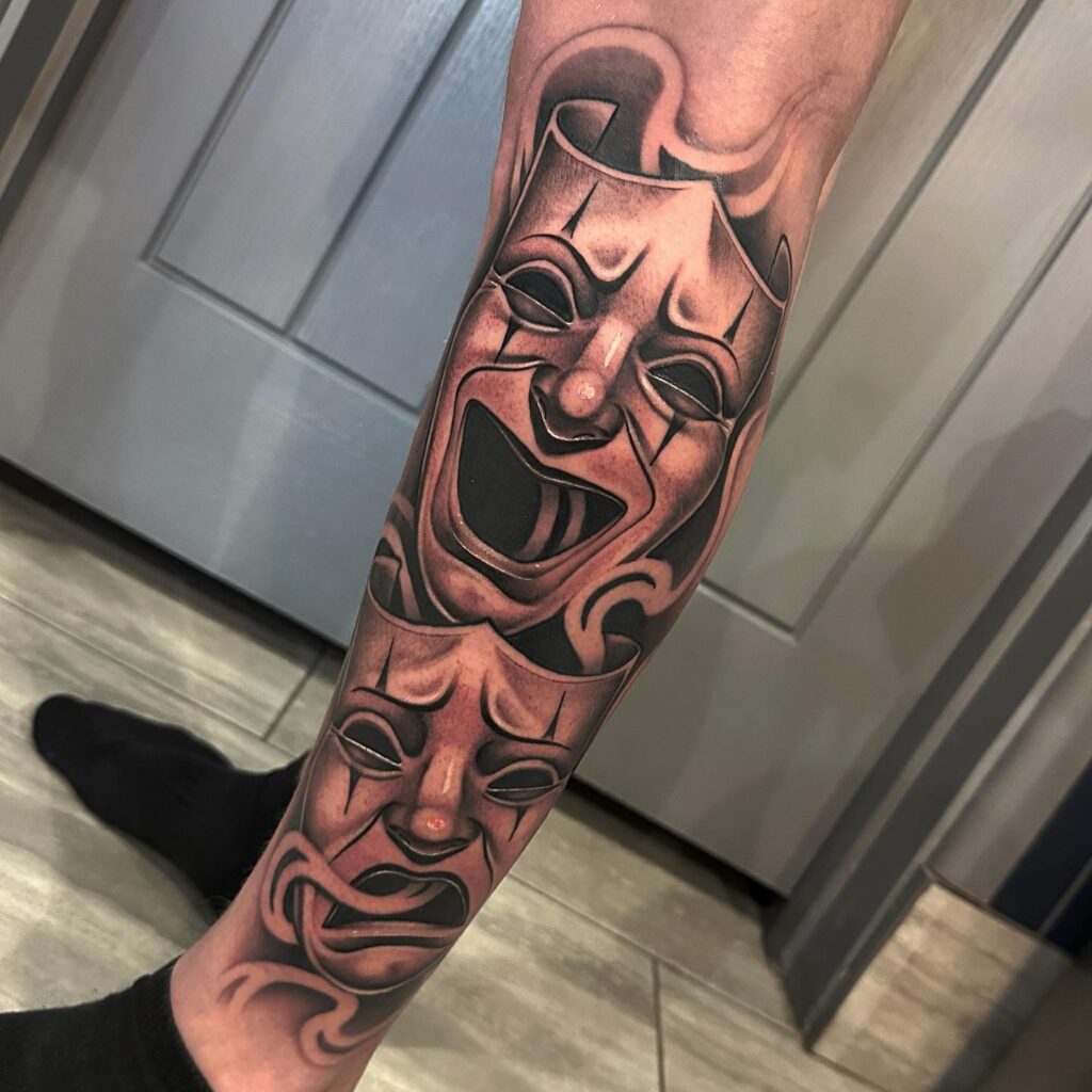 Smile now cry later tattoo design on leg side mens ink art inspiration 