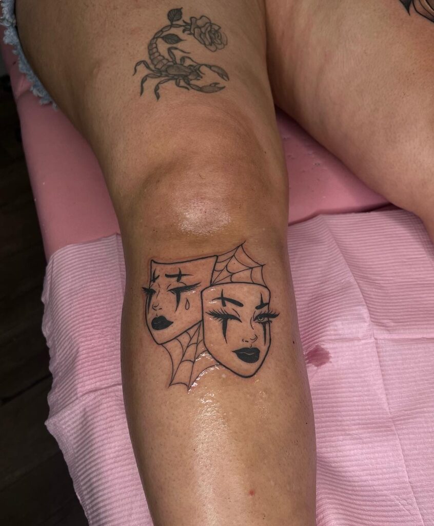 Smile Now Cry Later with Girl Face and Spider Background: Under Knee Tattoo