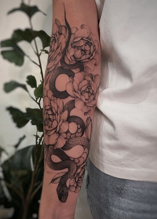Graceful Snake and Flower Tattoo Designs with Symbolic Meaning 1