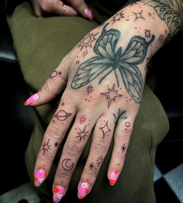 Space feelings butterfly hand tattoo