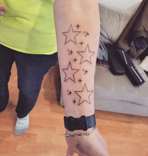 Sparkle forearm tattoo