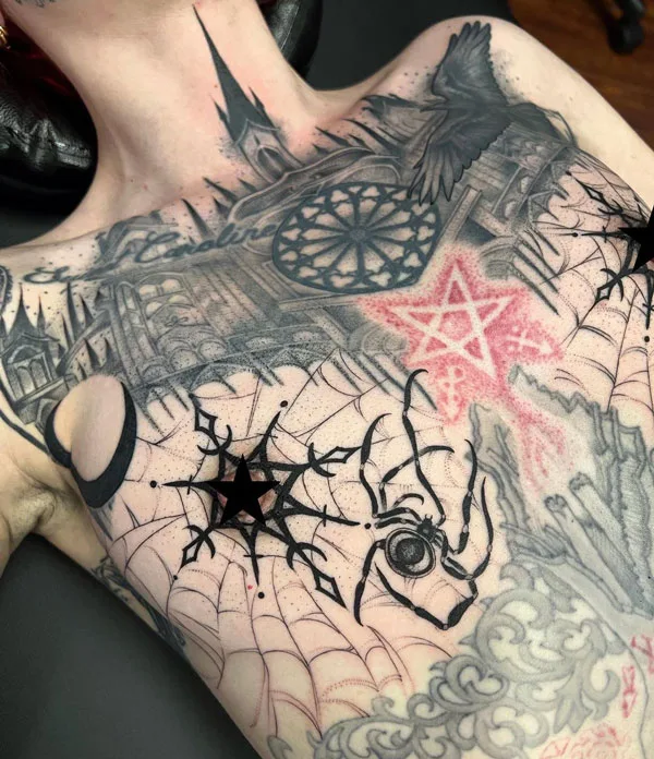 Spider web boob tattoo