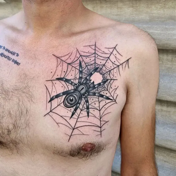 Spider web chest tattoo