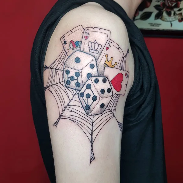 Spider web dice tattoo