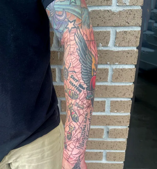 Spider web sleeve tattoo