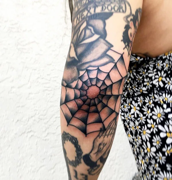 Spider web tattoo 6