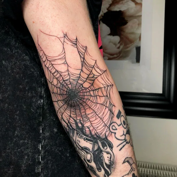 Spider web tattoo 7