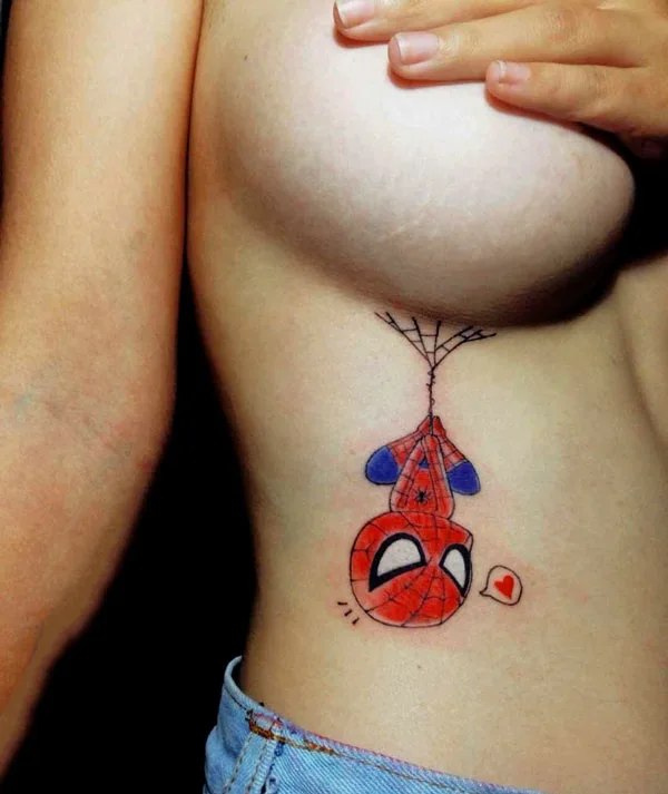 Spiderman tattoo under boob