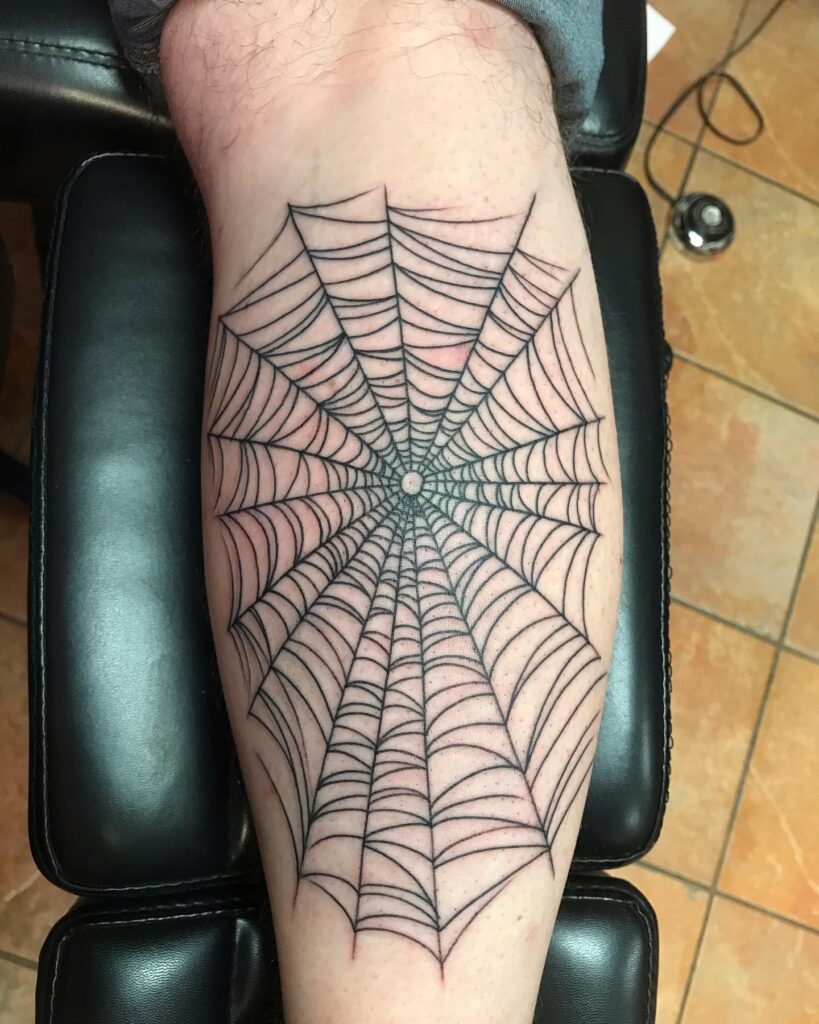 Spiderweb Tattoo Adding Edge to the Calf: Intricate Webs 