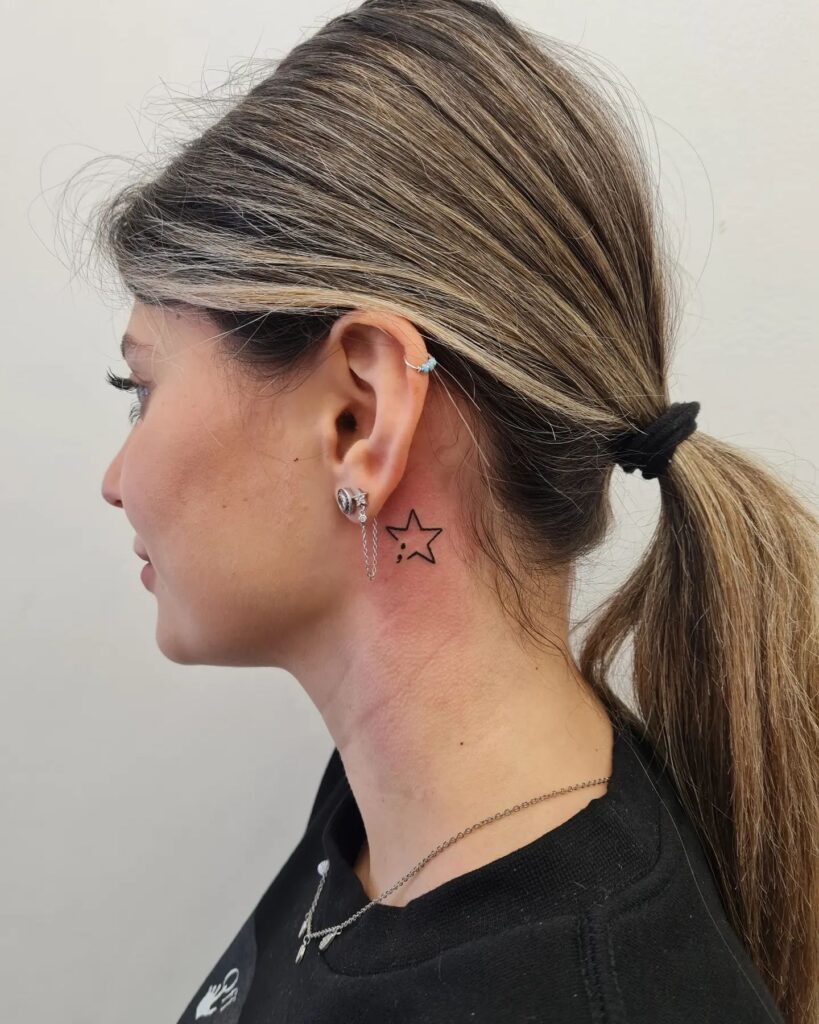Star Tattoo with Semicolon Behind the Ear: Stellar Connection