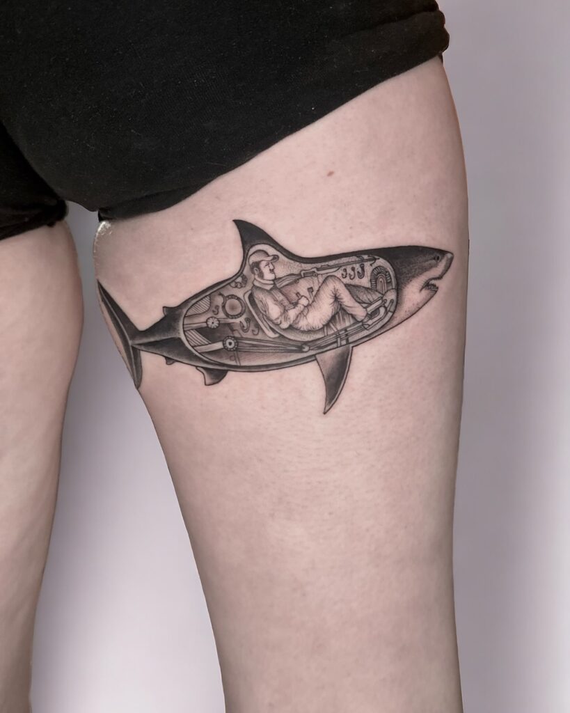 Steampunk mechanical shark tattoo with submarine design and pilot inside