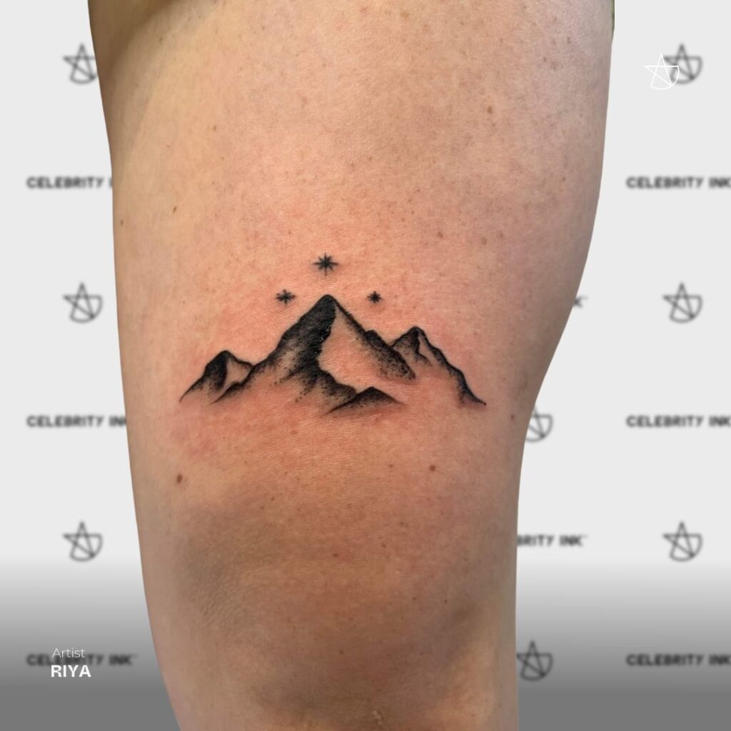 Stunning Minimalist Mountain Tattoo Elevate Your Style Above the Knee