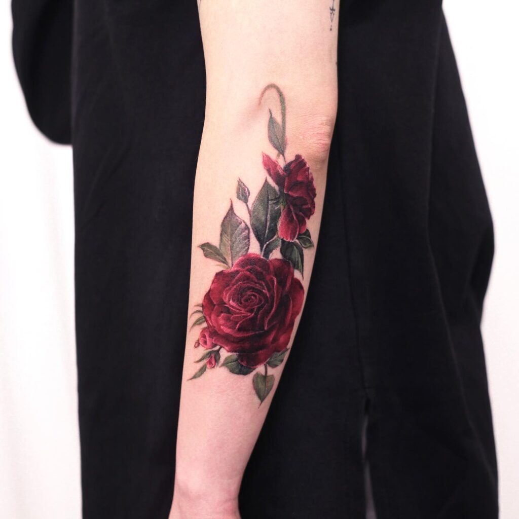 Stunning Rose Cover-up Forearm Tattoo Transforming the Past