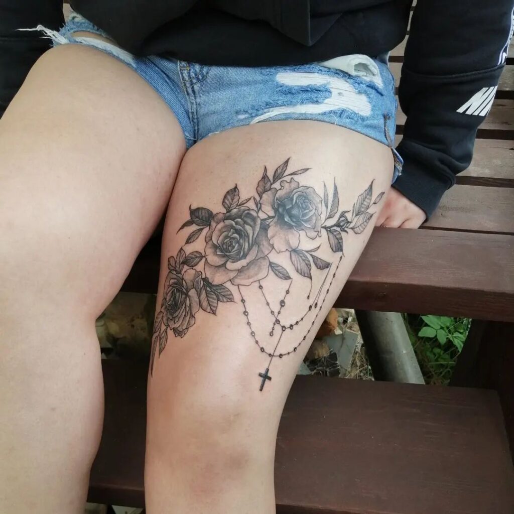 Stunning above knee floral tattoo designs for women