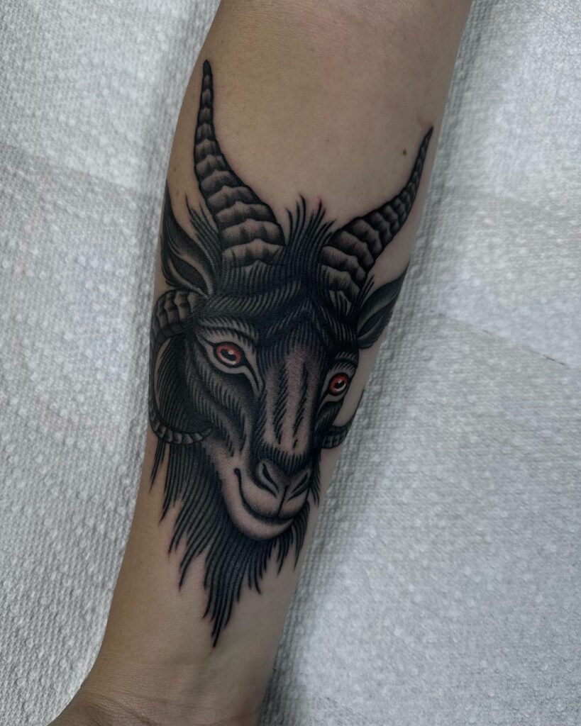 Stunning capricorn face tattoo blackwork inner wrist art