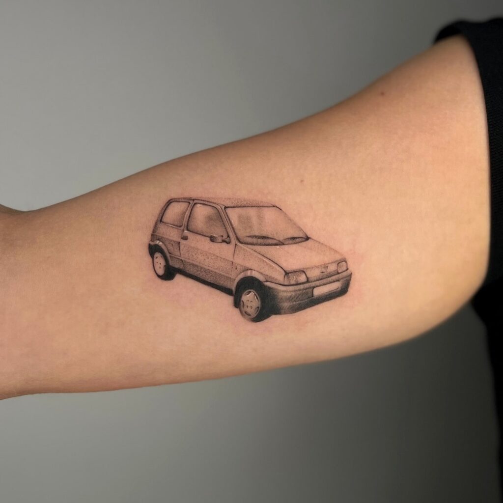 Stunning Fiat Uno Car Tattoo on Outer Upper Arm – Car Tattoo Ideas