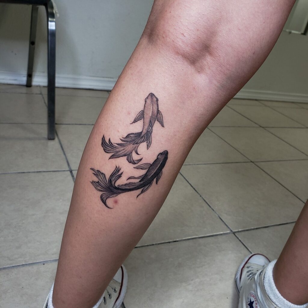 Stunning Koi Fish Tattoo on the Calf Featuring Three Graceful Koi: Koi Cascade 